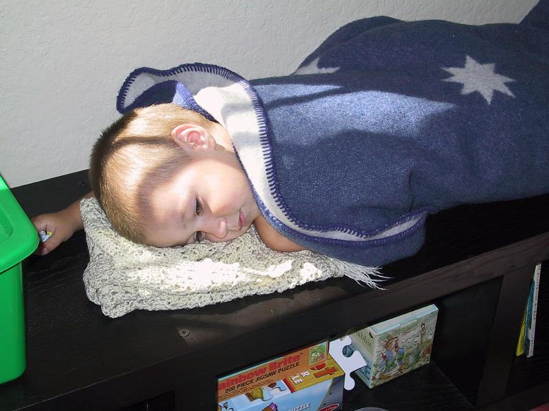 0815sick2.jpg - Sick -- all snuggled up...on a hard bench of his choice.