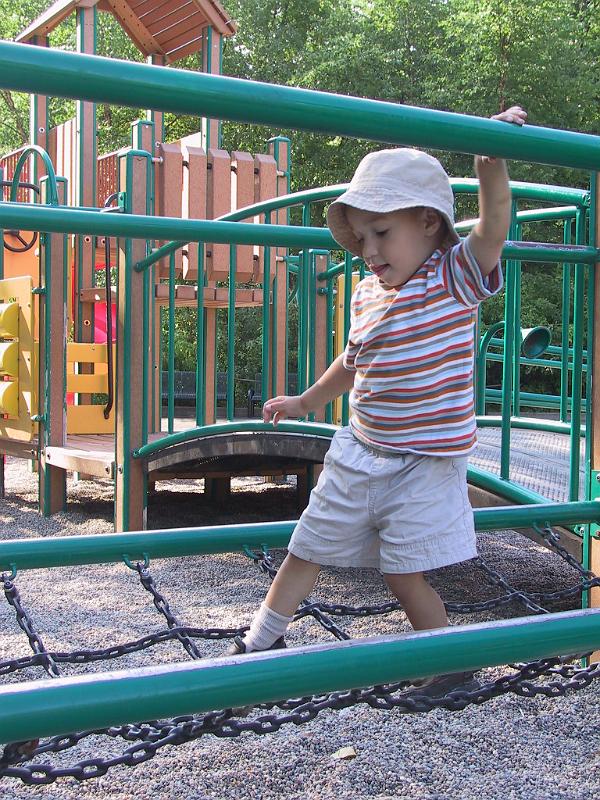 0822f.jpg - Owen balancing at the zoo playground.