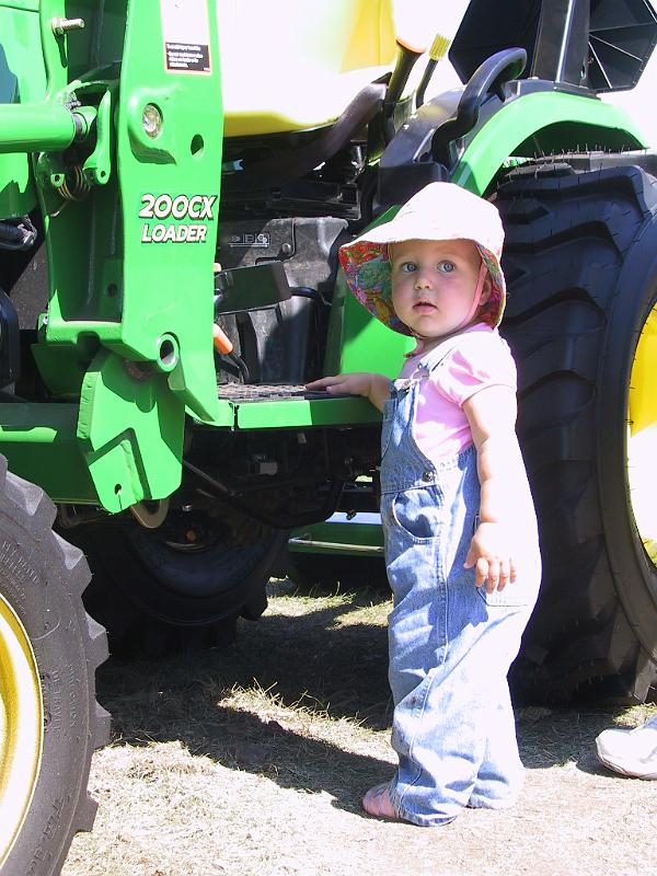 IMG_0035.JPG - Leah likes tractors, too.