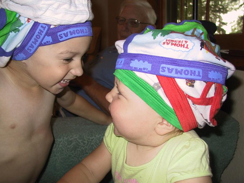 0803h.jpg - Both kids showing off this delightful triple-hat look for Great Grandma and Grandpa.