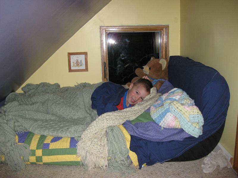 1128newbed.jpg - Owen sleeping in his new big mattress for the first time.  What a view he's got!