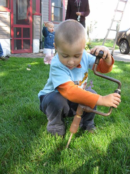 1010drill3.jpg - Owen drilling at Grandma and Grandpa's