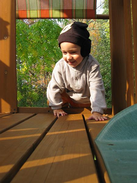 IMG_0111.JPG - Owen climbing up the ladder of the swing set