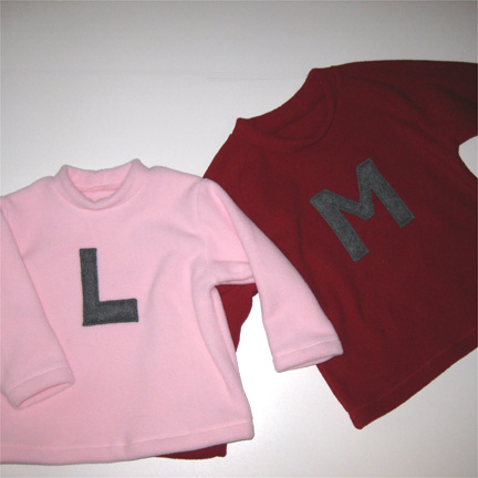 MLshirts.jpg - Brother and sister's favorite colors, with the same color initial.