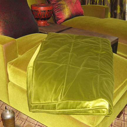 08ha-throw.jpg - A velvet throw quilted with a rectangular window-pane pattern.  (Room designed by Susan E Brown Interior Design.)