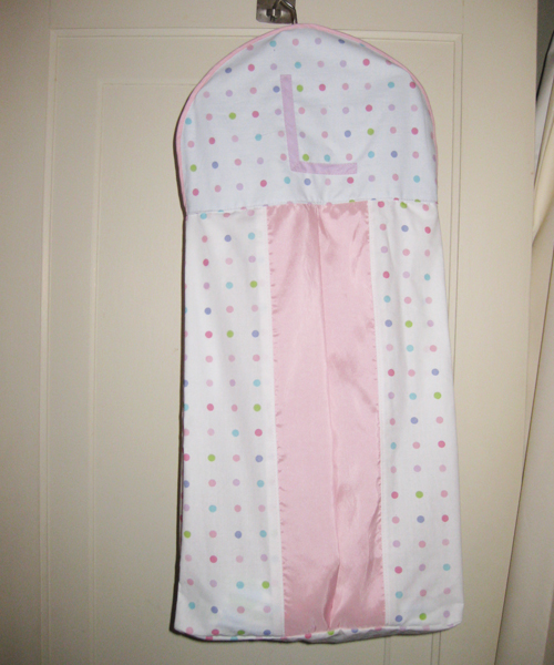 10al-diaper.jpg - A simple monogram and contrast borders dress up a custom made diaper storage hanger.